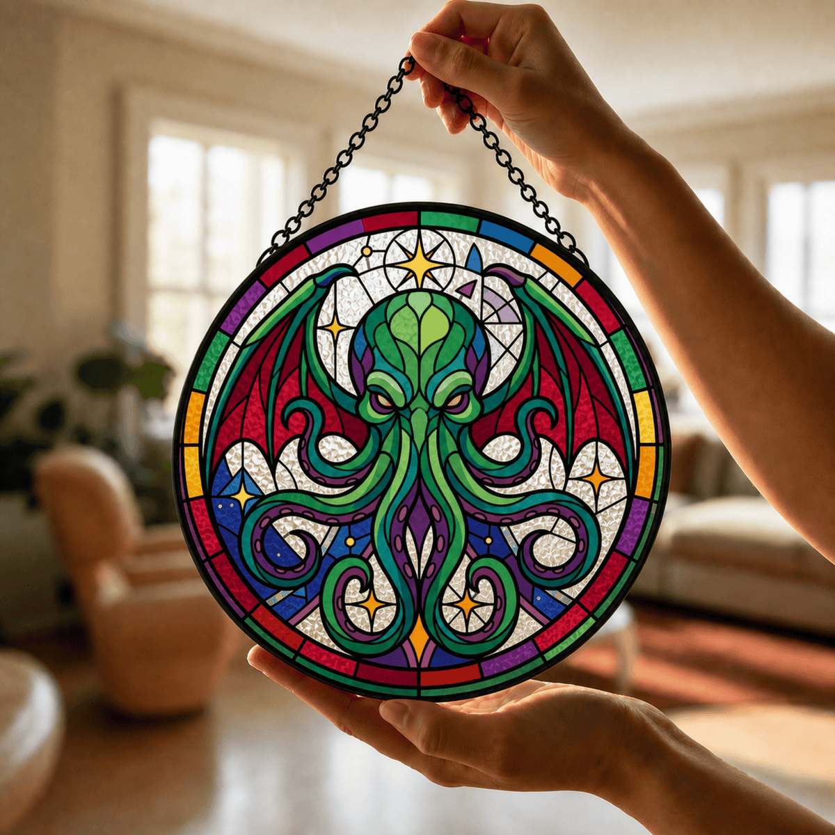 Hand holding the Astral Devourer stained glass suncatcher