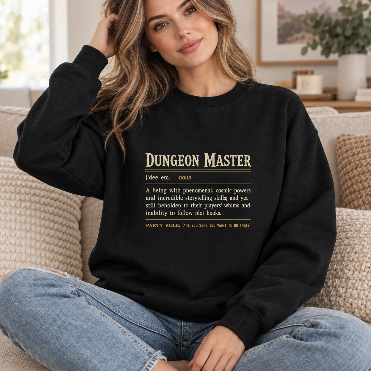 Dungeon Master Definition black DnD sweatshirt worn by a woman indoors