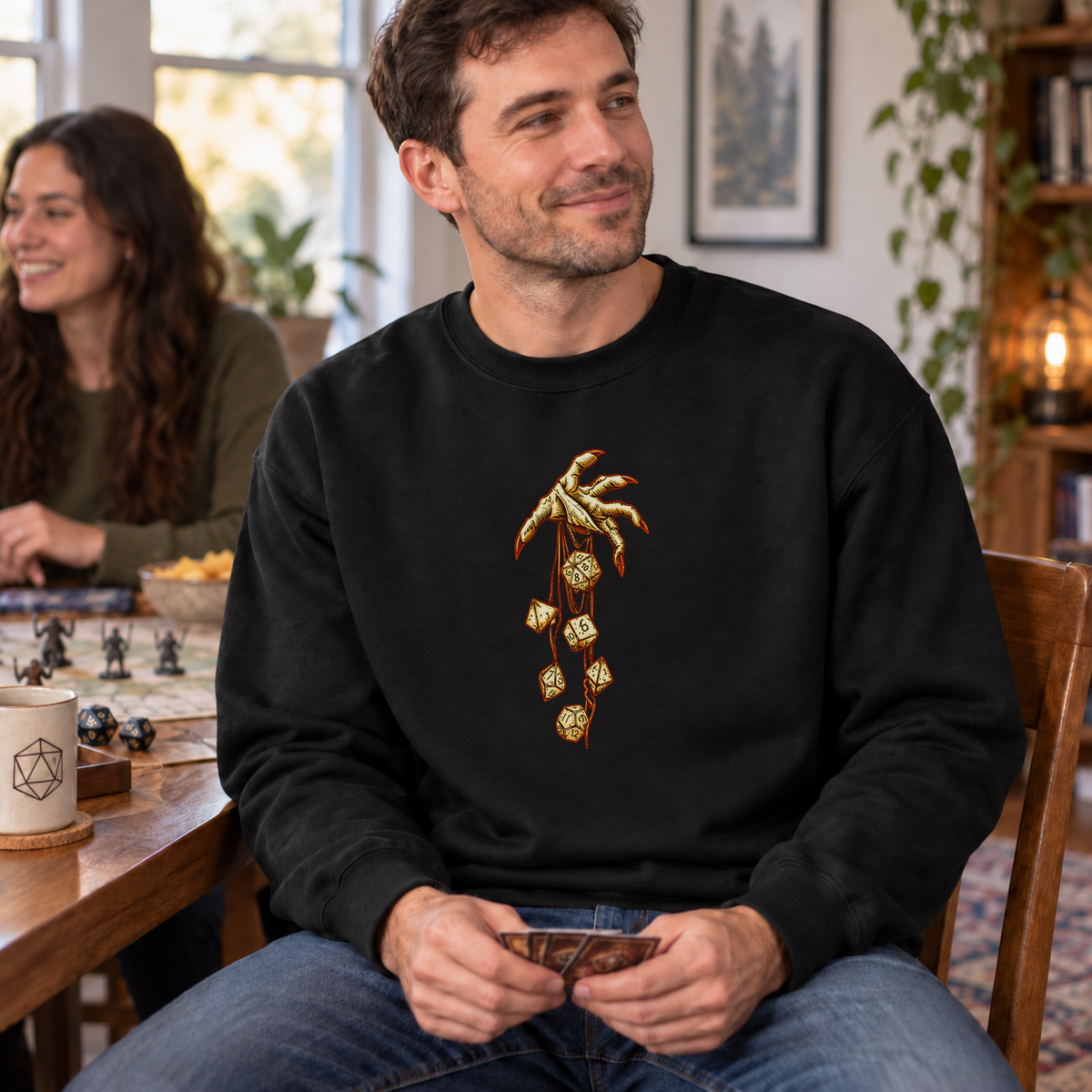 Roll of Fate black DnD sweatshirt worn by a man at game night