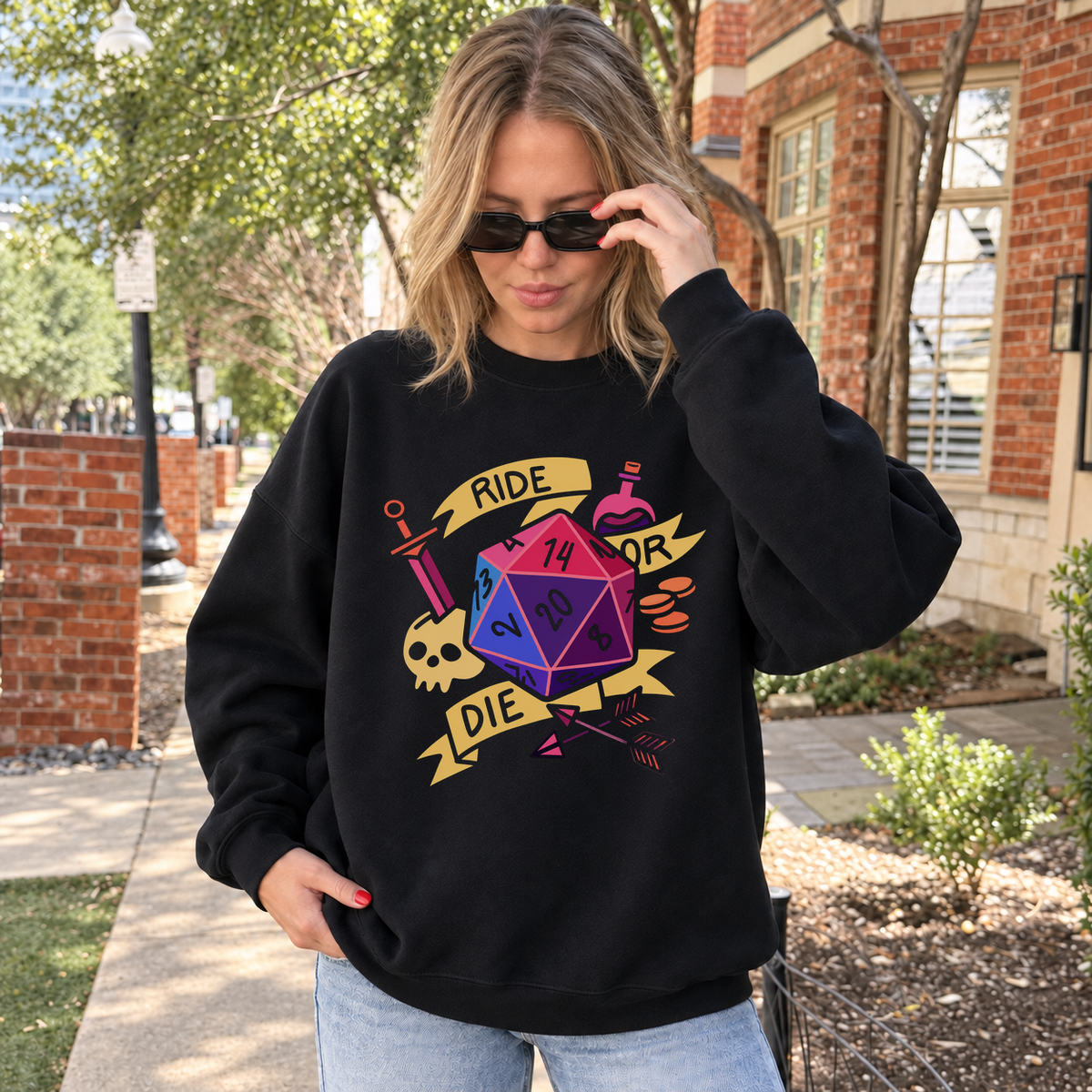 Ride or Die black DnD sweatshirt worn by a woman outdoors