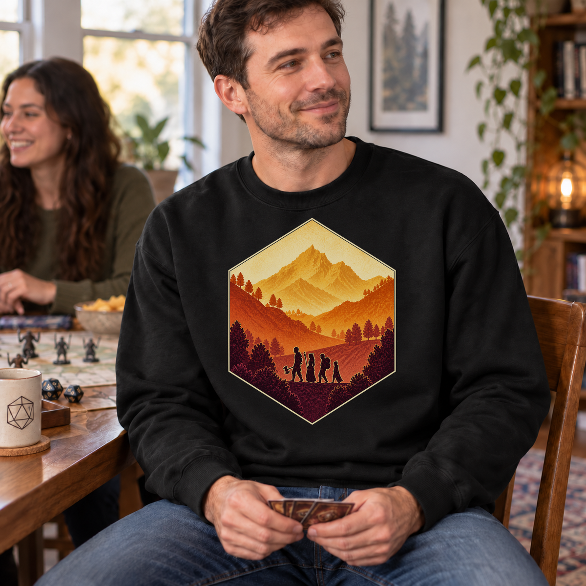 The Adventure Party black DnD sweatshirt worn by a man at game night