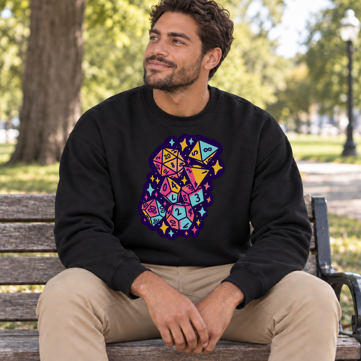 Colorful Dice Cascade black DnD sweatshirt worn by a man in a park
