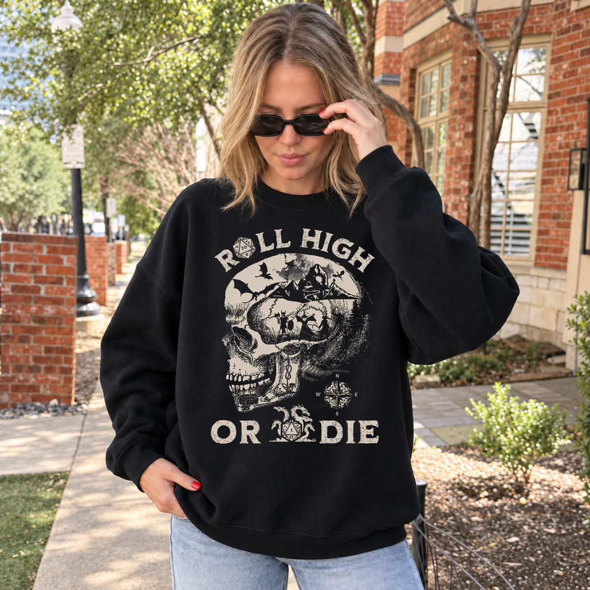 Roll High or Die Skull black DnD sweatshirt worn by a woman outdoors
