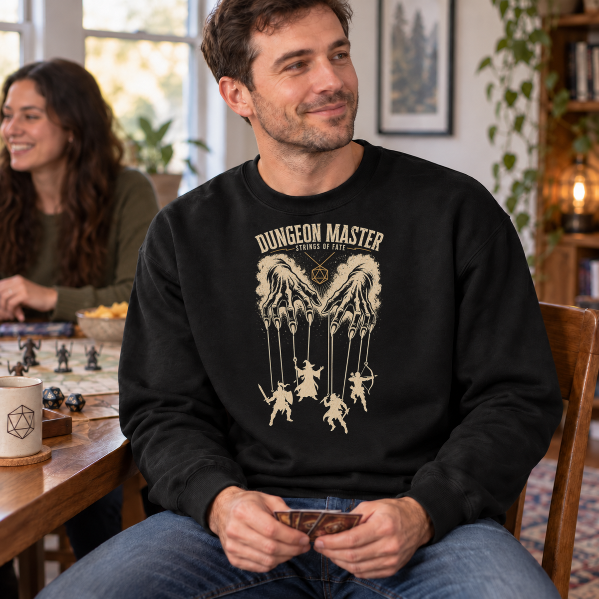 Dungeon Master Puppet Master black DnD sweatshirt worn by a man at game night