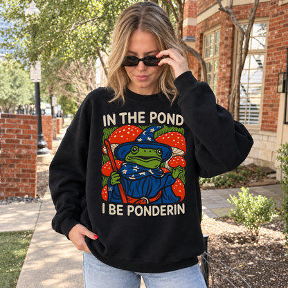 In the Pond I Be Ponderin’ black DnD sweatshirt worn by a woman outdoors