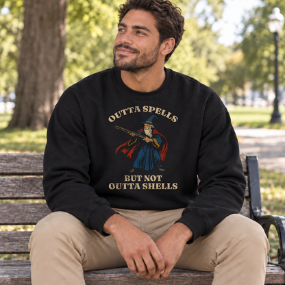 Outta Spells, Not Outta Shells black DnD sweatshirt worn by a man in a park