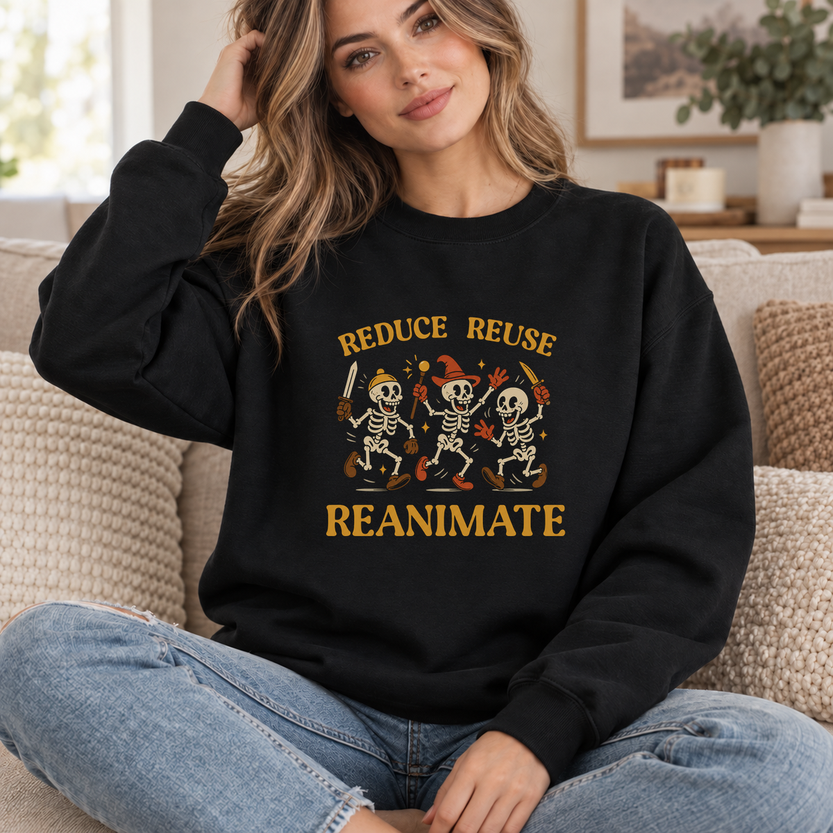 Reduce Reuse Reanimate black DnD sweatshirt worn by a woman indoors