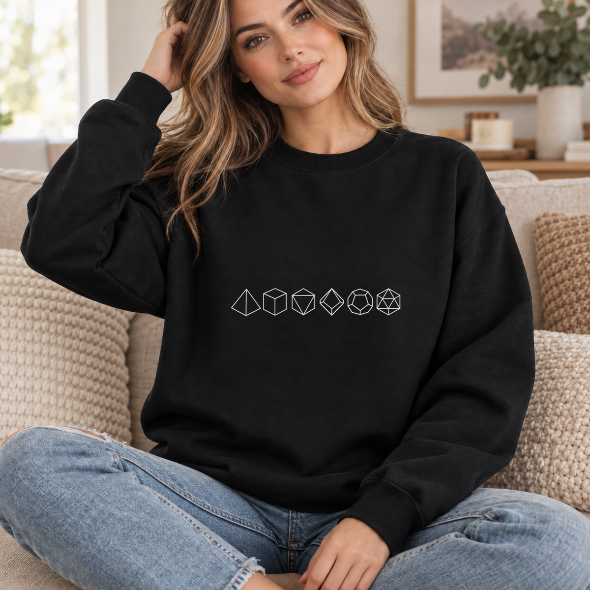 Polyhedral Dice Lineup black DnD sweatshirt worn by a woman indoors