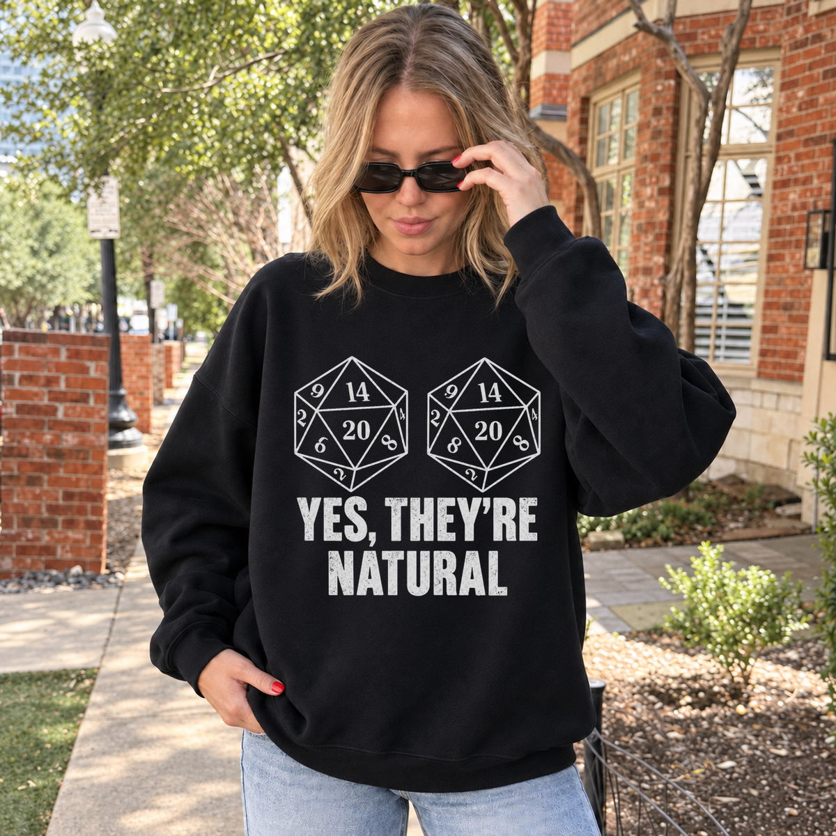 Yes, They’re Natural black DnD sweatshirt worn by a woman outdoors