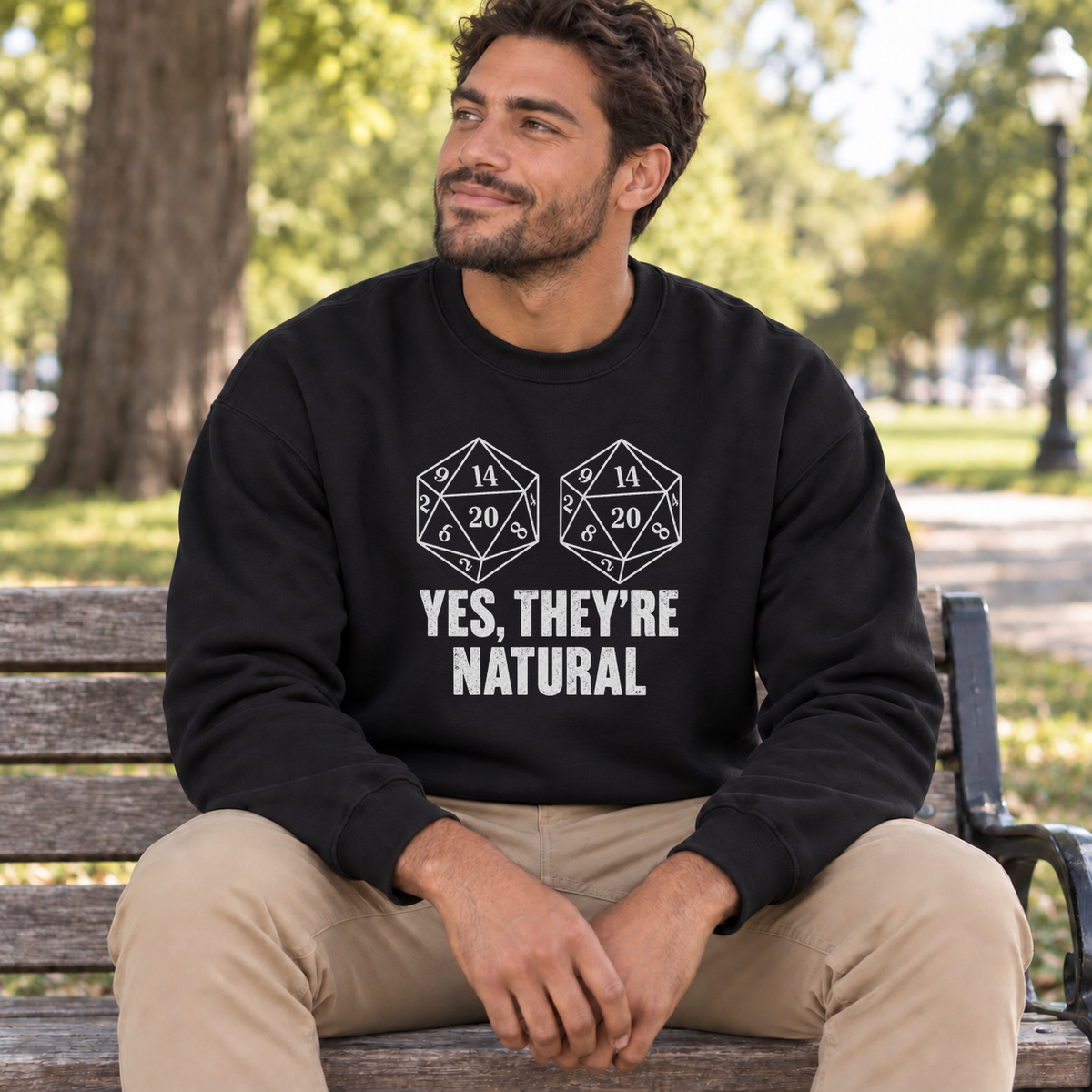 Yes, They’re Natural black DnD sweatshirt worn by a man in a park