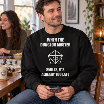 The Dungeon Master Smiles black DnD sweatshirt worn by a man at game night